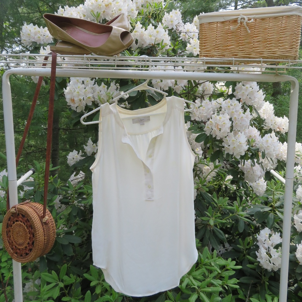 White sleeveless blouse